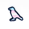 NerdyKeppie's Trans BONEYARD Crow Embroidered Pride Patch are shaped like their namesake and stitched on black duck cloth!