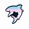NerdyKeppie's Trans BONEYARD Shark Embroidered Pride Patch are shaped like their namesake and stitched on black duck cloth!