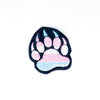 NerdyKeppie's Trans Bear Paw Embroidered Pride Patch are shaped like their namesake and stitched on black duck cloth!
