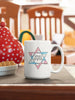 NerdyKeppie "B'tzelem Elohim" Star Of David Pride Coffee Mug. Our "B'tzelem Elohim" Star Of David Pride Coffee Mug is 15 ounces deep and ships directly from Portland, Oregon USA.