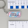 NerdyKeppie-"DOLL" Mirrored Pride Keychain-Trans