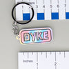 NerdyKeppie-"DYKE" Mirrored Pride Keychain-Trans