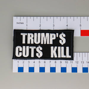 NerdyKeppie's "Trump's Cuts Kill" Embroidered Patch are stitched on sturdy rectangular duck cloth and backed with vinyl fuse.
