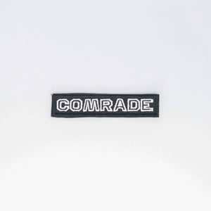 NerdyKeppie's White "Comrade" Embroidered Patch are stitched on sturdy rectangular duck cloth and backed with vinyl fuse.