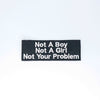 NerdyKeppie's White "Not A Boy Not A Girl Not Your Problem" Embroidered Patch are stitched on sturdy rectangular duck cloth and backed with vinyl fuse.