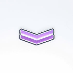 NerdyKeppie's White Queer Chevron Embroidered Pride Patch are stitched on black duck cloth and backed by sturdy vinyl fuse.