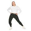 A person wearing a NerdyKeppie Scattered Dice Plus Size Aro Pride Leggings. 