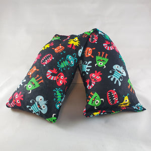A NerdyKeppie Cute Little Monsters Halloween Cotton Heat & Cold Pack. 