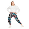 A person wearing a NerdyKeppie Engraved Bats Trans Pride Plus Size Leggings. 