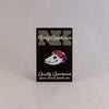 NerdyKeppie Proud to the Bone Possum Skull Pride Enamel Pins. A possum skull pride enamel pin for our Proud to the Bone project, wearing an adorable crown of flowers!