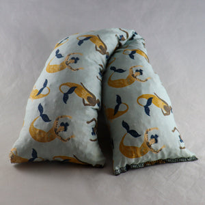 A NerdyKeppie Mermaids of Color Cotton Heat & Cold Packs. 