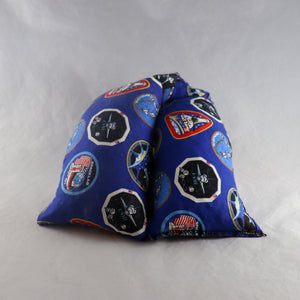 A NerdyKeppie NASA Mission Badges Cotton Heat & Cold Packs. 