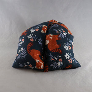 A NerdyKeppie Playful Red Pandas Cotton Heat & Cold Packs. 