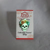 NerdyKeppie Proud to the Bone Glow-in-the-Dark Human Skull Progress Pride Enamel Pin. An adorable glowing skull enamel pin wearing a Progress Pride flower crown. This 1.25" pin makes a perfect gift for all pin collectors!