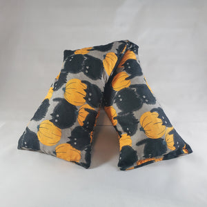A NerdyKeppie Puffy Cats & Pumpkins Cotton Heat & Cold Packs. 