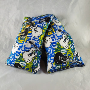 A NerdyKeppie Rock and Roll Guitars Cotton Flannel Heat & Cold Pack. 