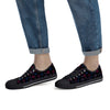 NerdyKeppie Scattered Dice Canvas Low Top Bi Pride Sneakers. A canvas low top sneaker with a scattered dice design on it in bisexual pride colors. These low top bi pride sneakers go up to US Men’s 14!