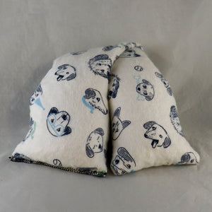 A NerdyKeppie Furry Fuzzy Friend Faces of the Doggo Persuasion Flannel Heat & Cold Packs. 